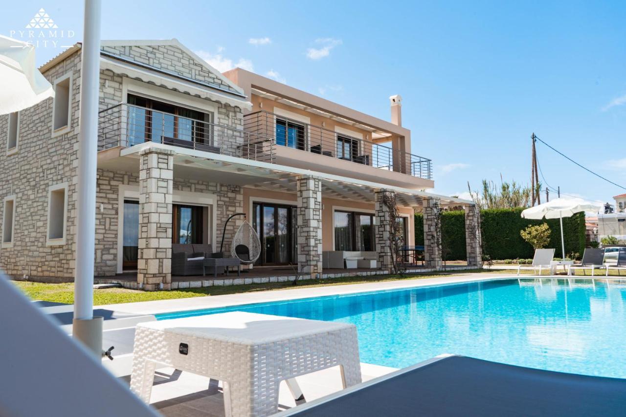 Luxury Villa Hera - Beachfront Roda  Exterior foto